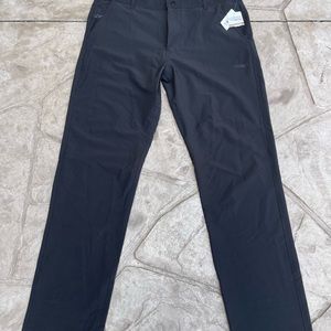 COPPER FIT LIGHTWEIGHT GOLF PANTS. CONDITION IS NEW. SZ L.
